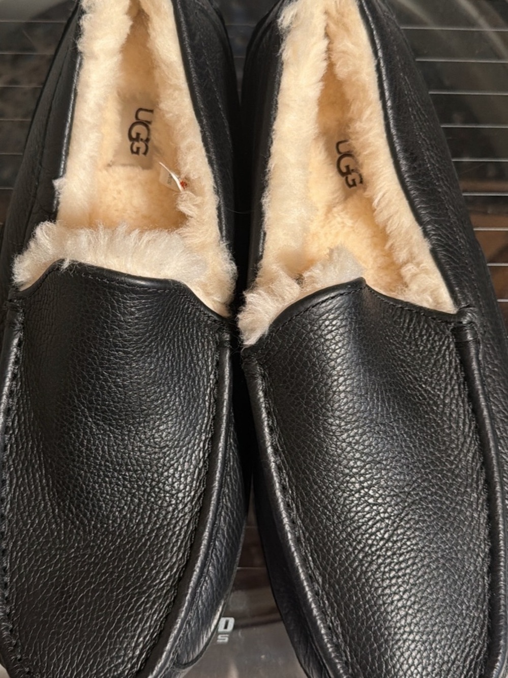 UGG Men’s Black Leather Shearling-Lined Slip-Ons